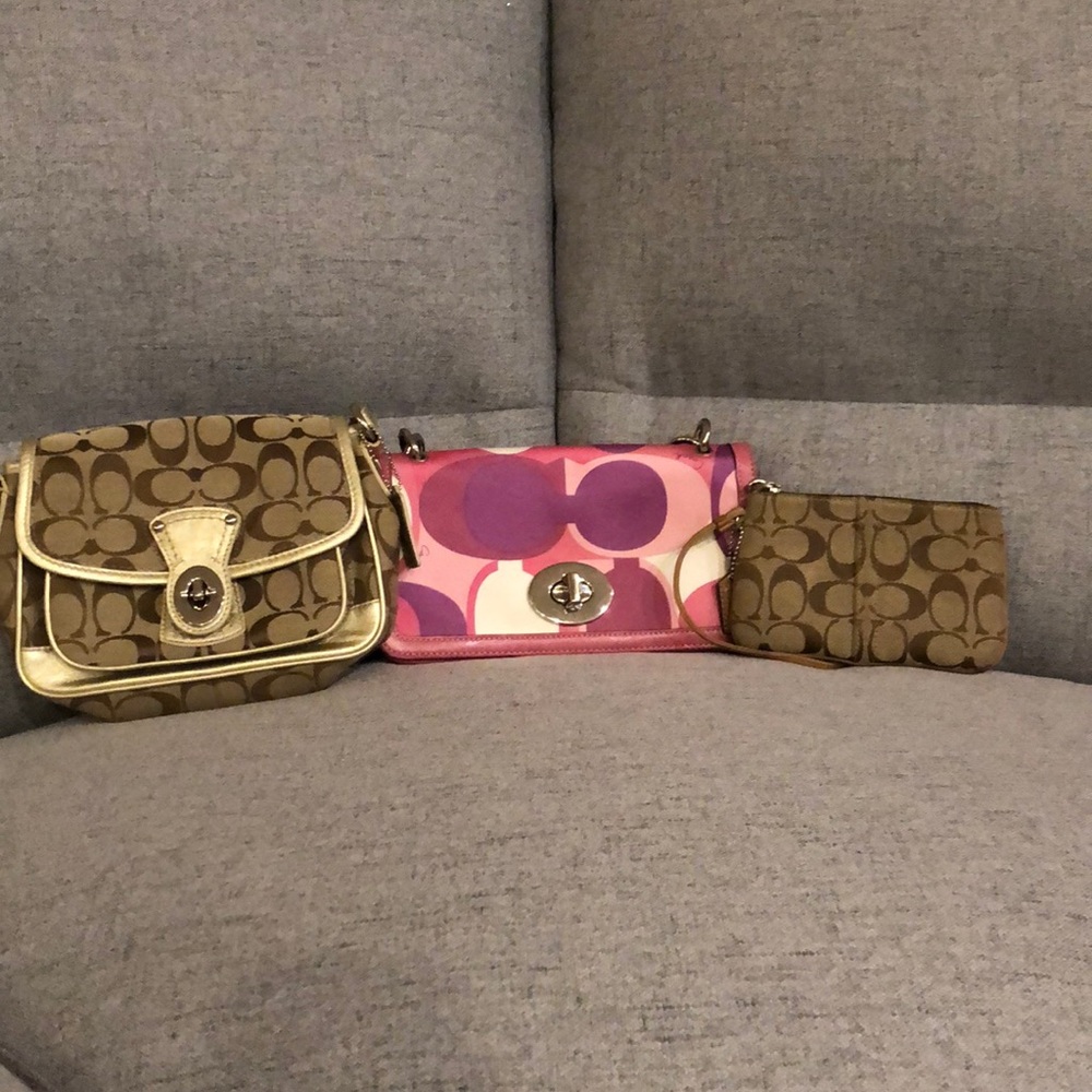Bulk coach wristlet and two small bags.